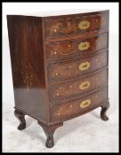 A 20th Century hardwood and brass inlaid bow front