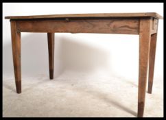 A country oak rustic 19th century, possibly French writing table desk. Of simple form raised on