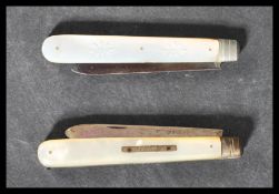 Two 19th century Victorian silver hallmarked fruit knives having mother of pearl handles. One