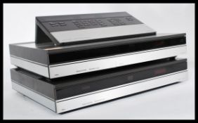 A 20th Century Bang and Olufsen music system to include a Beomaster 5000, CD 50 and a Control