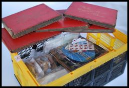 A large collection of assorted cigarette cards and stamps mostly in albums with some loose stamps.
