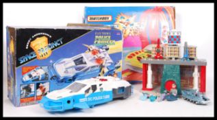 A retro 1993 Matchbox Double Looper play set together with Gerry Anderson's Space Precinct Police