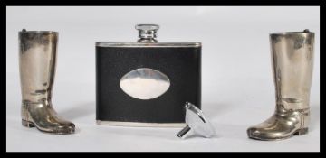 A pair of vintage mid Century silver plated drinking measures modelled as a pair of horse riding