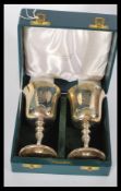 A pair of Bristol 600 silver hallmarked goblets by Barker Ellis Silver Co bearing Birmingham