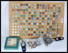 A large collection of enamel golf ball markers, collected from different golf clubs over a number of