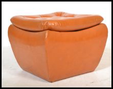 A stunning retro 20th Century work box/ pouffe, upholstered in a vibrant orange vinyl, button back
