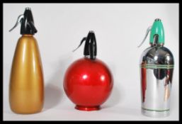 A collection of 3 retro 1960's / 1970's soda syphons to include a Chrome Sparklets, Gold BOC and a