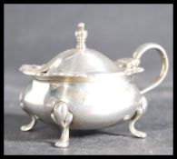 An early 20th century silver hallmarked table salt condiment / mustard pot by William Suckling