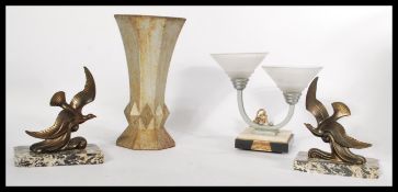 A group of Art Deco items to include a pair of spelter bird clock garnitures on marble bases , a