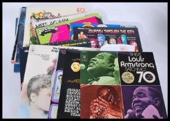A collection of long play LP vinyl artists to include Louis Armstrong, Tom Jones, The Everly