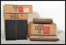 A stunning three piece music stereo system by Bang and Olufsen / B & O, all packed in original boxes