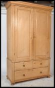 A Victorian 19th century country pine tall armoire