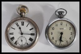 A silver hallmarked Continental open faced pocket watch, enamel face Roman numerals subsidiary