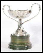 An early 20th century Art Nouveau silver plated twin handled centerpiece in the manner of WMF /