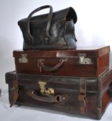 A group of vintage retro 20th century luggage to include a hide case , bag and leather suitcase.