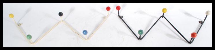 A pair of vintage retro 20th century Sputnik Atomic coat hooks having coloured ball finial ends. One