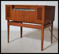 A vintage / retro 20th Century teak cased HMV ( His Masters Voice ) record player deck, fitted