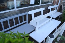 A collection of painted wooden benches to include 2 white benches, a painted grey bench and