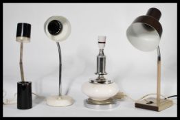A collection of four retro / vintage 20th Century work / desk lights to include a Anglepoise 92,