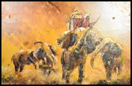 A 20th century oil on canvas painting of elephants and rider signed to the corner Lemmonier.