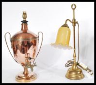 A 19th century Regency copper samovar converted to a table lamp along with a vintage brass