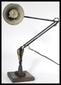 A vintage retro 20th century Herbert Terry wall mounted anglepoise desk workshop industrial lamp