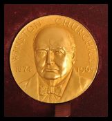 A solid 22ct Gold limited edition 216 / 1000 commemorative medal  for Winston Churchill, made by
