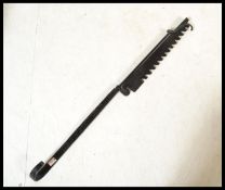 A 19th Century Victoria  cast metal Fire side roasting tool, adjustable  ratchet / pot jack  top