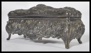A fantastic 19th century Victorian art nouveau pewter casket embossed decoration with cherubs ,