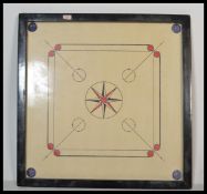 A 20th Century Carrom playing board. Carrom is a 