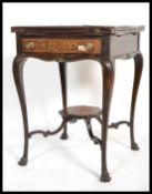 An Edwardian mahogany and marquetry inlaid envelope card - games table in the manner of Edwards &