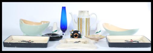 A collection of retro ceramics to include shaped table dishes of two tone colour, studio glass vase,