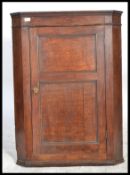 A Georgian 18th century hanging country oak corner