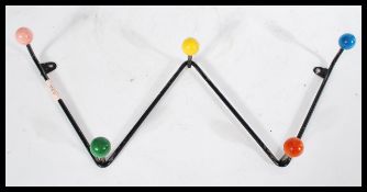 A set of vintage retro 20th century Sputnik Atomic coat hooks of zigzag form having a painted finish