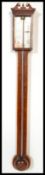 A 19th century Georgian stick barometer. The mercury barometer with mahogany backing having