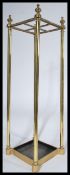 A Victorian 19th century brass tubular umbrella / stick stand. Quarter section with tray base having