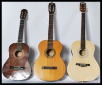 A 20th Century six string acoustic guitar by Kay applied paper label reading Kay KC333 together with