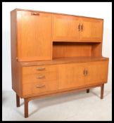 A vintage / retro G plan teak high board / sideboard from the Sienna range enclosed by an