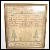 A 19th century Victorian framed and glazed needlep