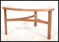 A retro 1970's 20th century G Plan - ' Astro ' teak wood coffee table with circular glass inset