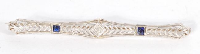 An 18ct white gold art deco bar brooch set with sapphires and diamonds. Weighs 4 grams.