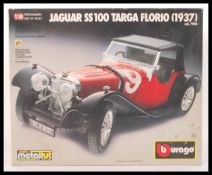 An original vintage Burago Jaguar SS 100 Targa Florio ( 1937 ) cod. 7006 model car kit. 1/18 scale