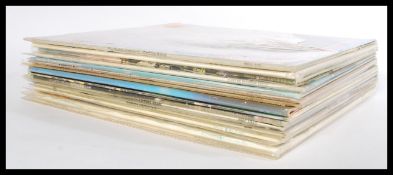 A collection of vinyl long play LP record albums to include Rod Stewart - Atlantic Crossing, A night