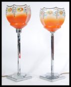 A pair of vintage early 20th century 1930's  Art Deco table lamps raised on stepped square bases