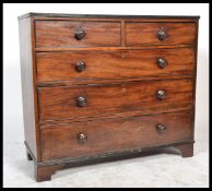 A 19th century mahogany Georgian chest of drawers being raised on bracket feet with 2 short over 3