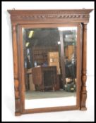 An early 20th Century mahogany framed over mantel