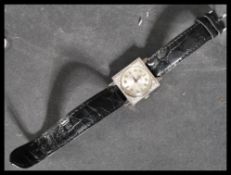 A believed American market 14ct white gold Longines mechanical wristwatch with a square silvered