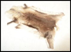 A vintage 20th century Reindeer skin taxidermy floor rug of typical form. Please see images.
