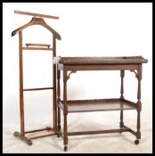 A 1920's oak card table trolley with baize lined fold over table top together with a gentleman's