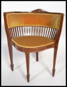 An Edwardian mahogany inlaid corner chair having railed back with inlaid borders, the chair being